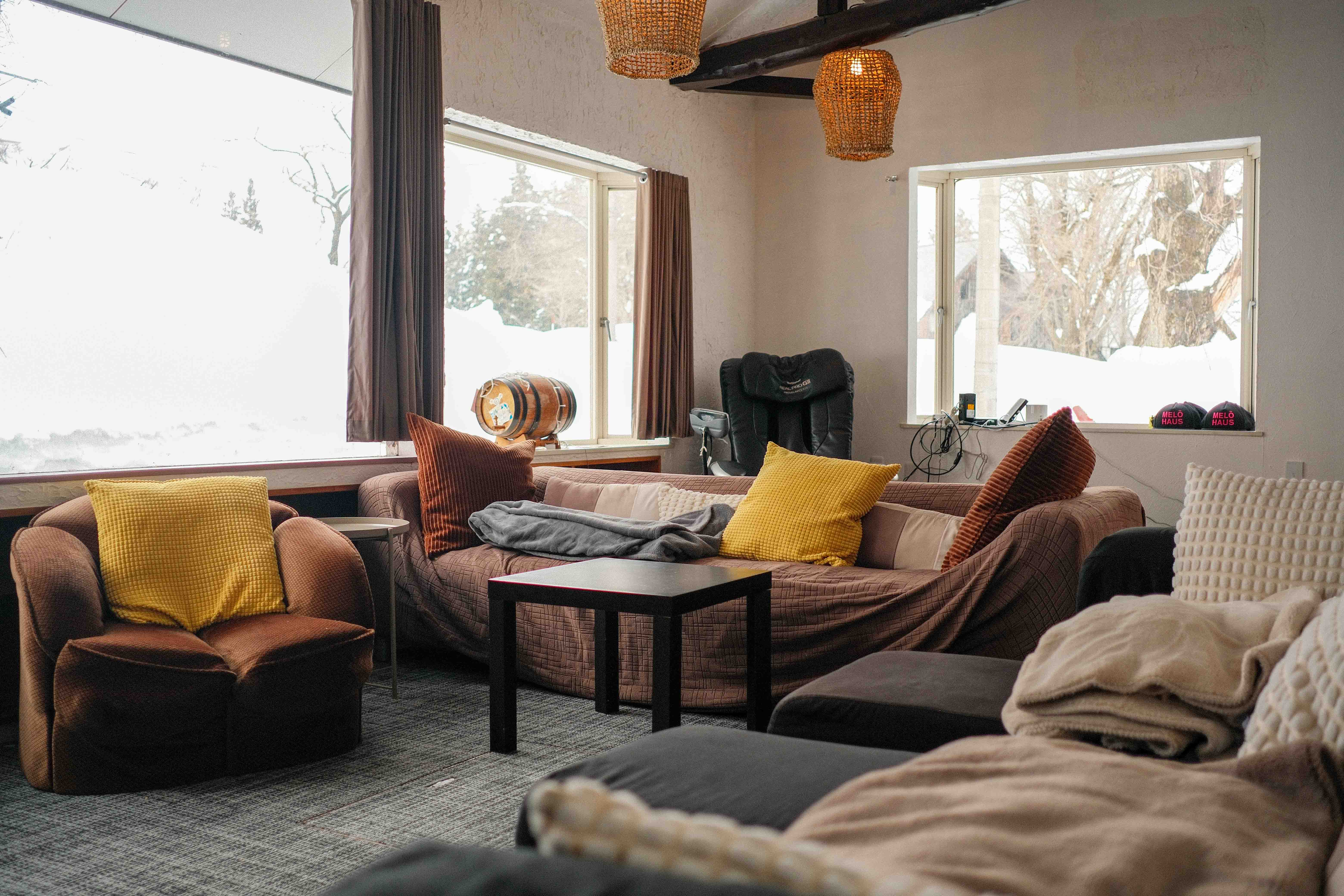 Lounge with warm textiles and mountain views