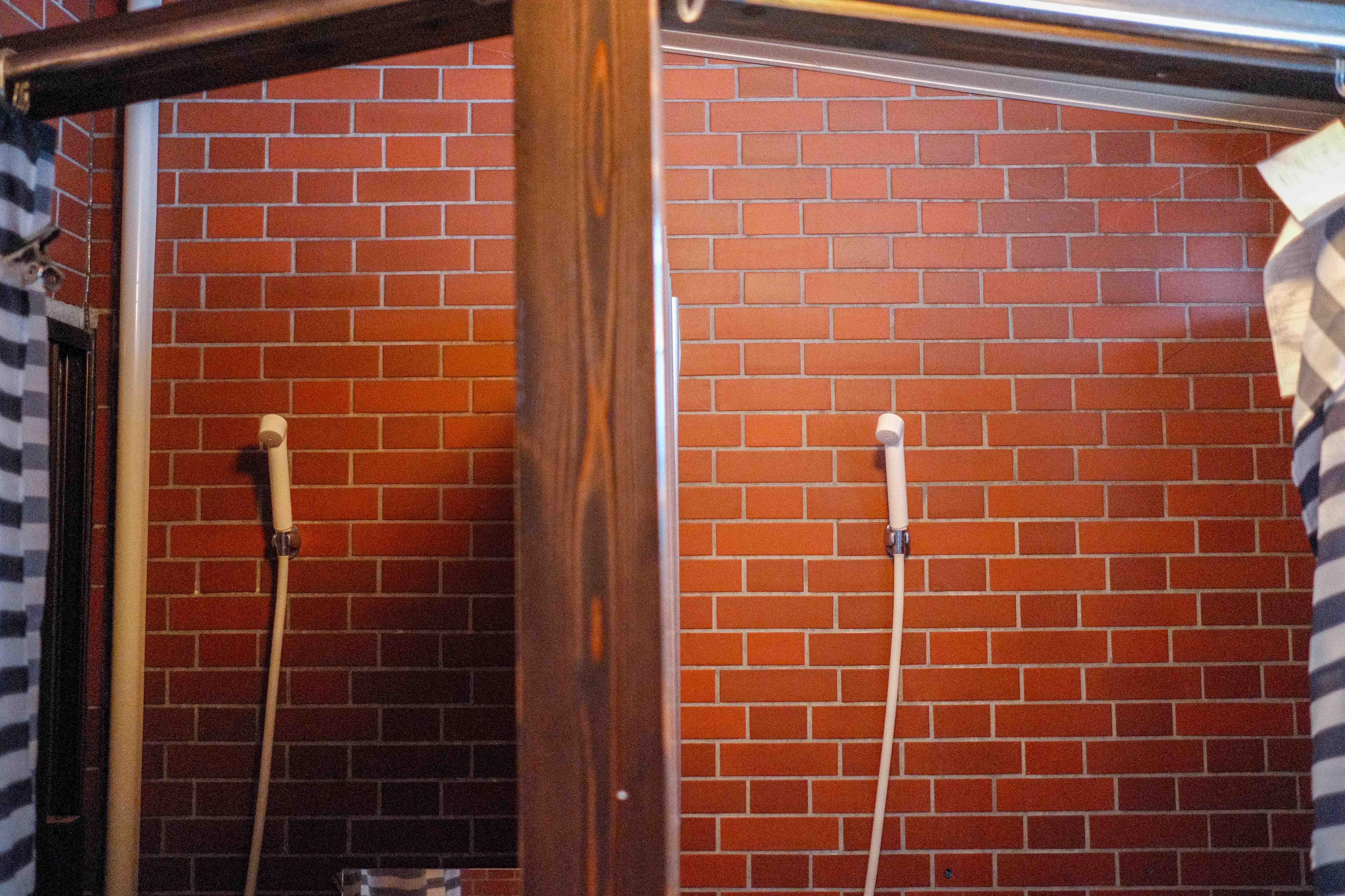 Shower area with terracotta tile